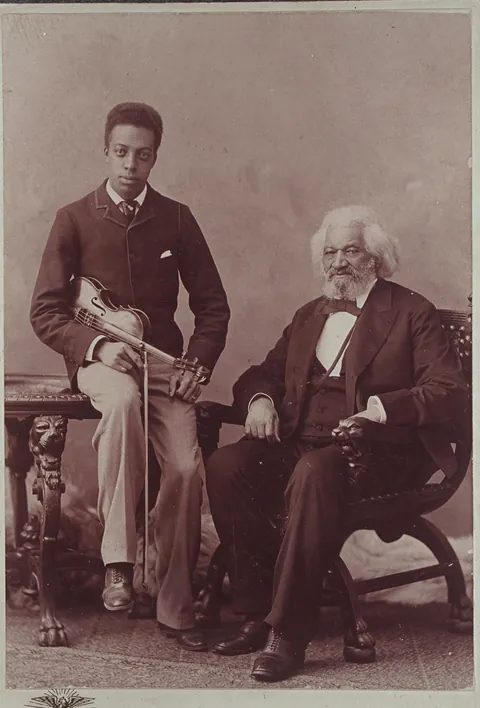 Frederick Douglass posing with his grandson, Joseph, 1894