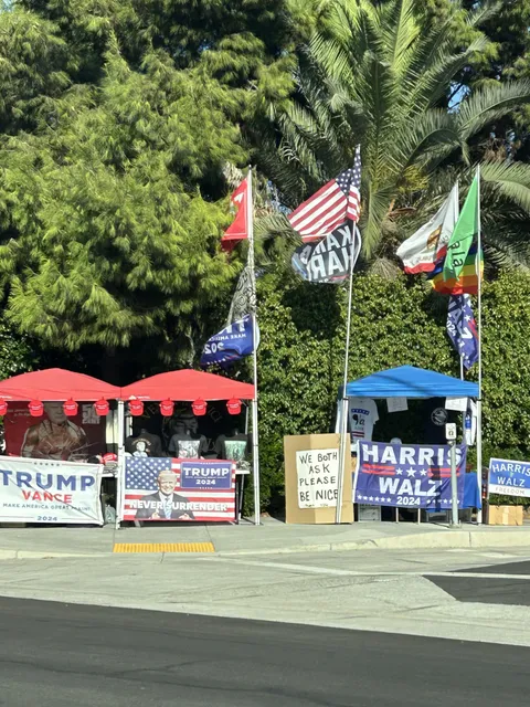 A campaign tent for Harris and Trump decided to set up shop right next to each other