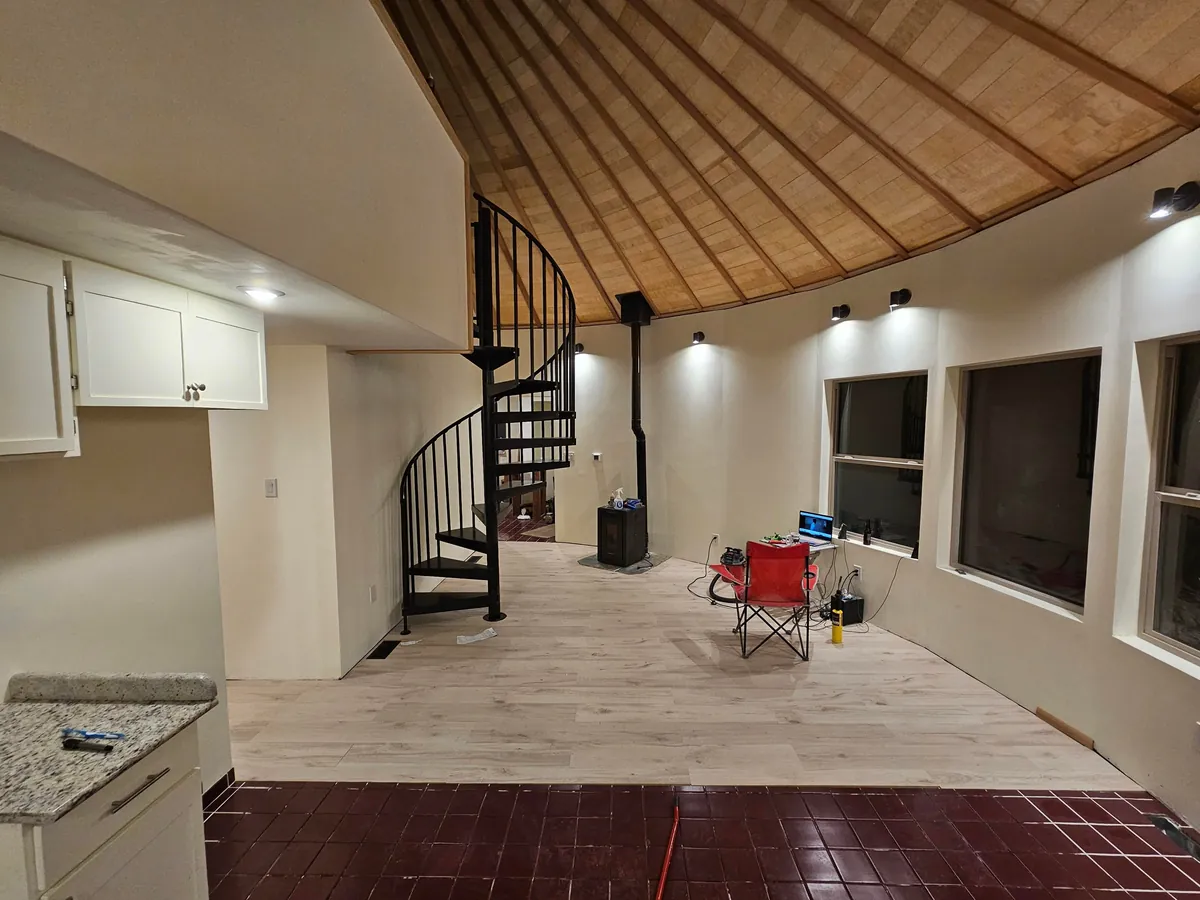 Spent several years building a complete 1300 sq ft roundhouse from top to bottom with my wife, including all framing, electrical, plumbing, HVAC, etc. By far the worst idea we've ever had, and so happy to be in it finally.