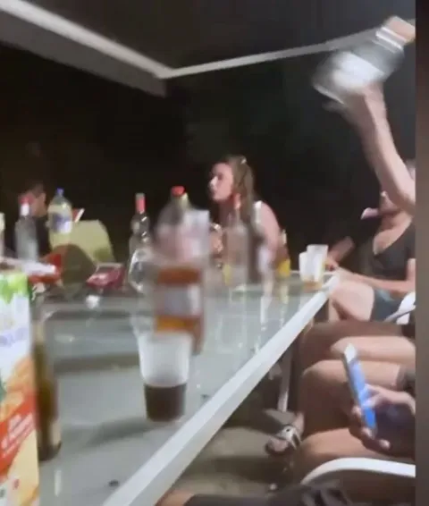 I don’t think this is the best way to pass a bottle
