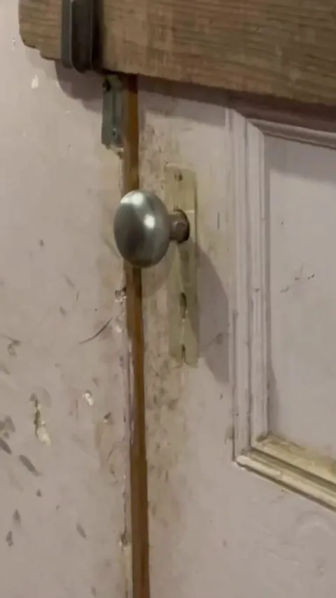 Someone is trying to open the door