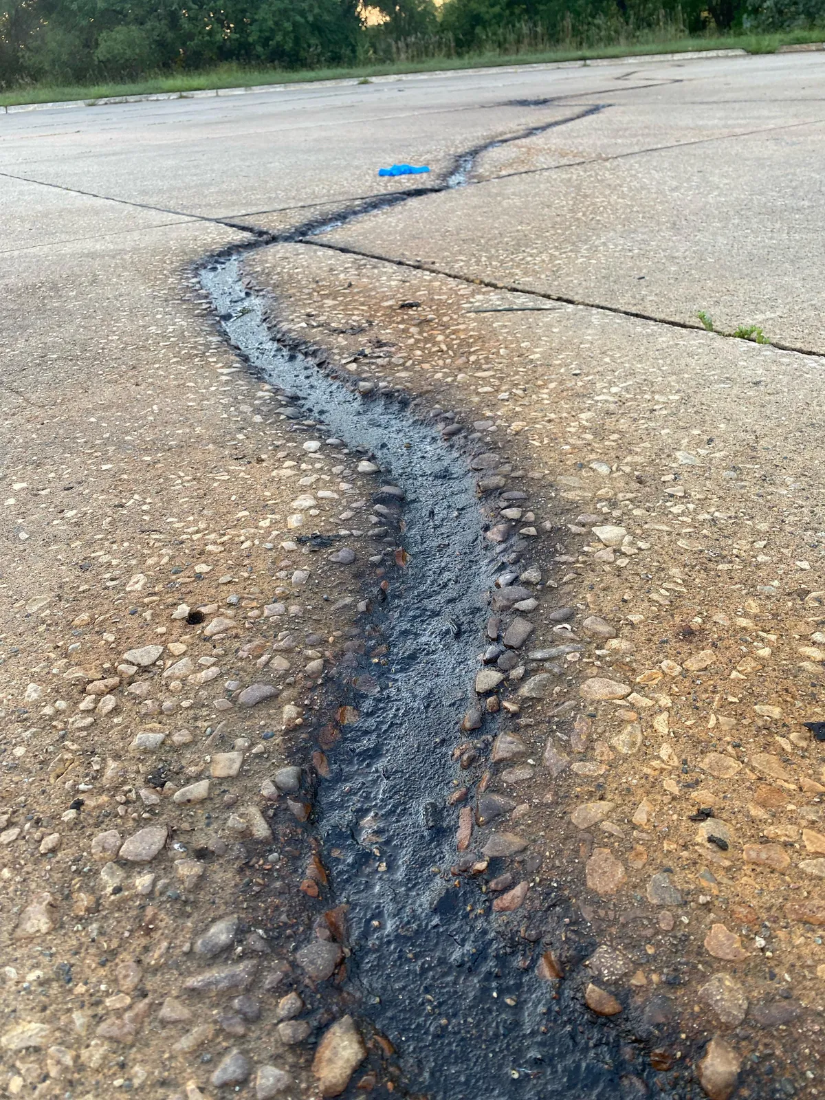 Heres a stream of liquid that been at it so long it's channeled into concrete