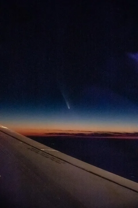 I was on a flight from sfo to yvr and unexpectedly caught the comet! Luckily i had my camera on me! 