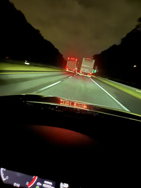 On my way to work then I see a semi switch lanes to the left and sits next to the other semi