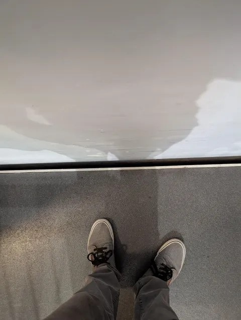 Dropped my passport down this hole to nowhere while lining up to board my flight.