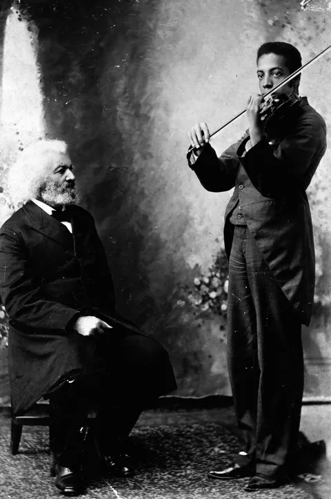 Frederick Douglass with his grandson Joseph, (1895)