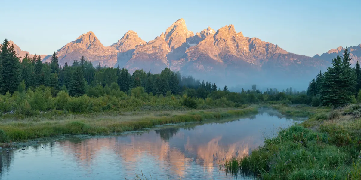 A foggy and breathtaking sunrise at Grand Teton National Park, Wyoming, USA [OC][6016x3008]