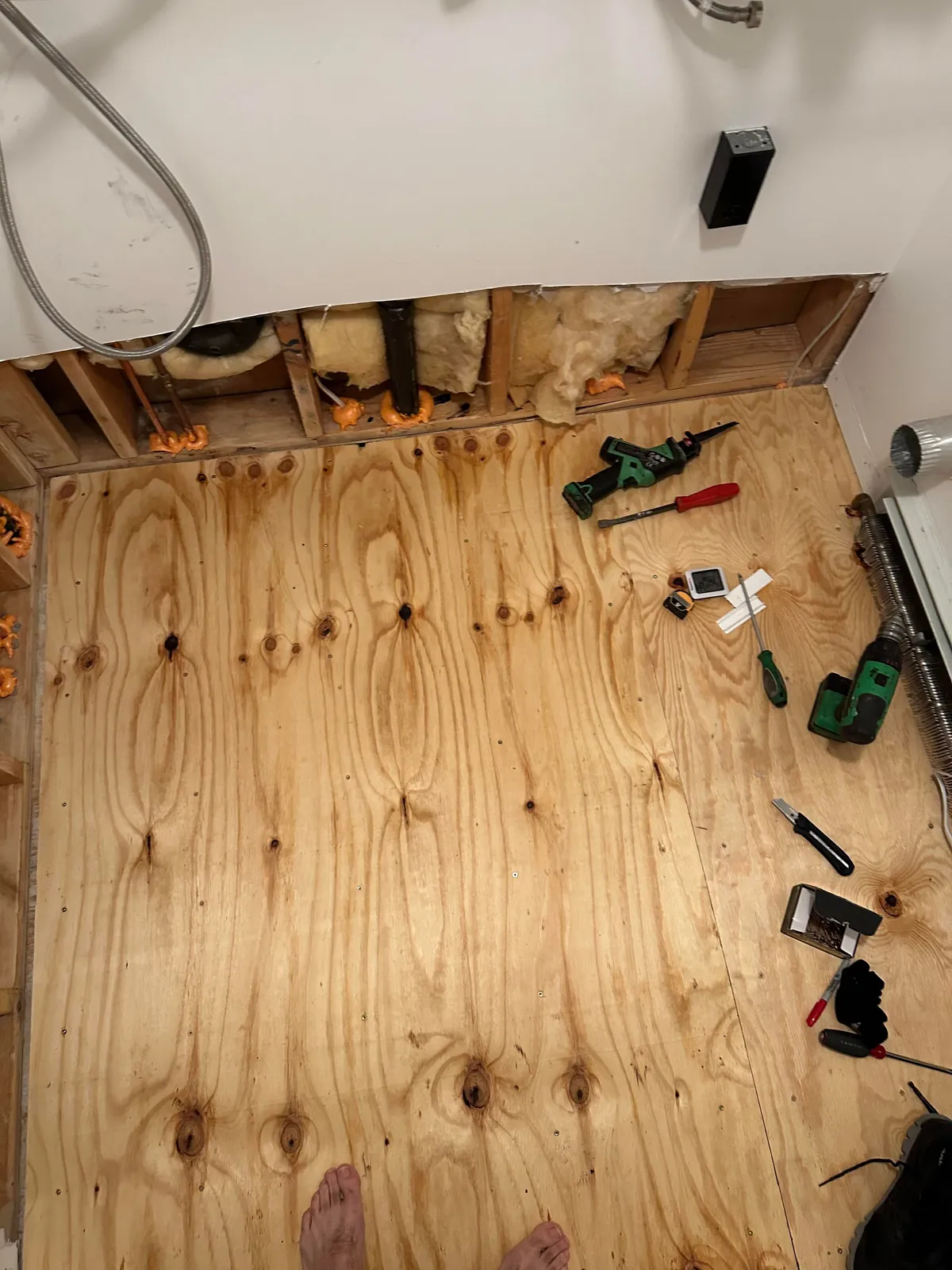 Washer flooded my laundry room so I learned how to tile.