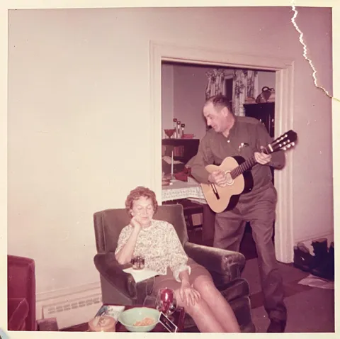 My Grandfather serenading my Grandmom. (1960s)