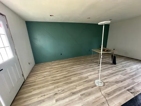 Turned my 1903 three car garage into 1/2 garage and 1/2 bedroom and bathroom my