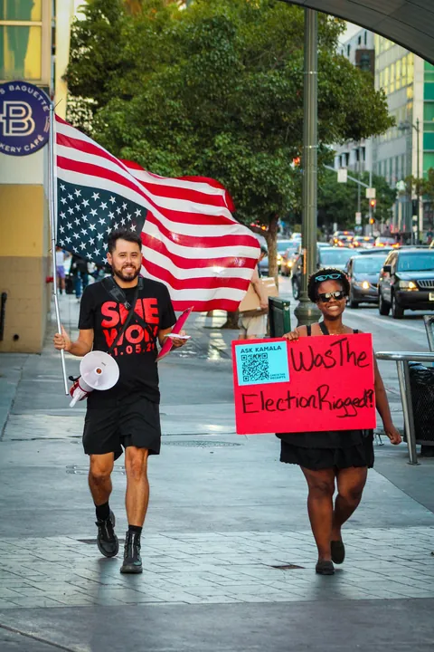 tried to capture the mood outside Kamala Harris’ book tour stop in Los Angeles on Monday [OC]