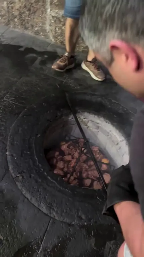 Taking this grill out of a pit barbecue