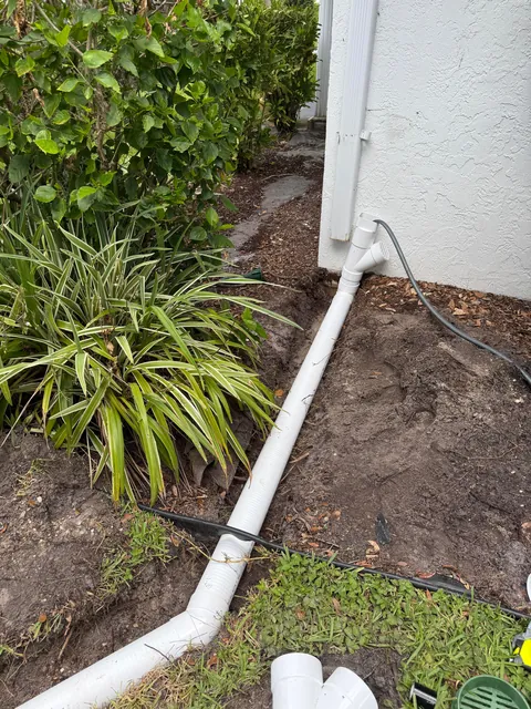 Hurricanes kept flooding my backyard so I buried 140ft of drainage pipe to prevent it.