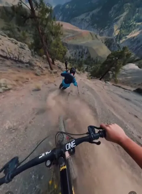 Skiing down a dirt trail