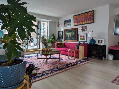 Colorful, cozy and with a cat, my living room is looking happy this morning.