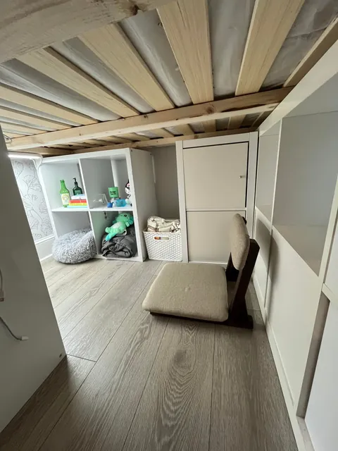 Built a storage bed with thrifted shelves