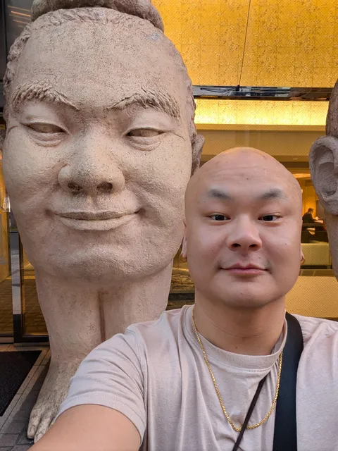 [OC] Just came back from Japan. Found my favorite statue by the Dotonbori Hotel in Osaka