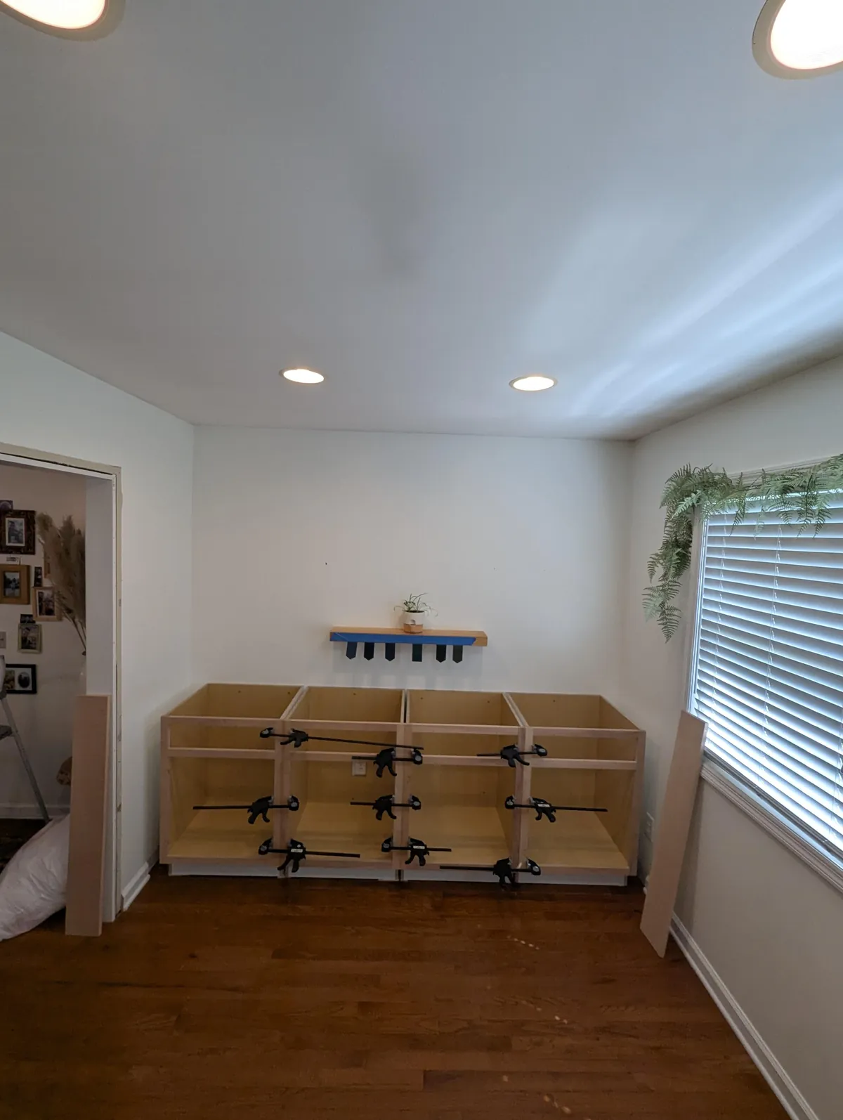 Three weeks ago I learned what a brad nailer is. Today I finished my built-in cabinets!