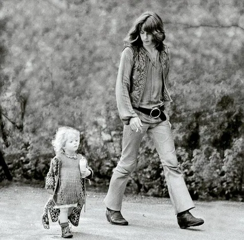 Hip Dad walking with his Daughter in Amsterdam, 1968.