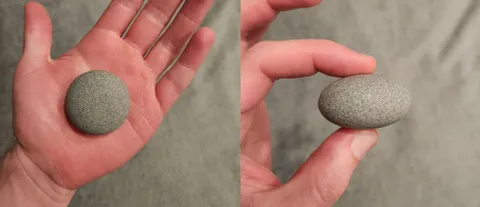 Perfectly circular from above, perfect ellipse from the side. The perfect river stone.