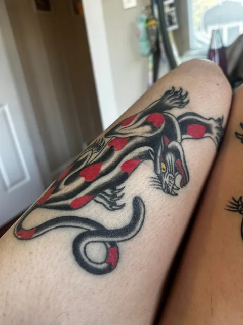 My thigh kitties! One fresh, one healed - done by Felipe Miranda in Portland OR