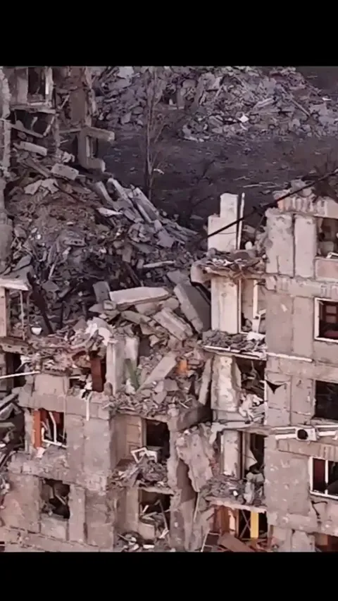 A russian soldier hiding from a drone in the "liberated" city Toretsk, Ukraine.