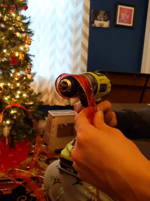 Rolling up ribbon got you down? Try using a drill