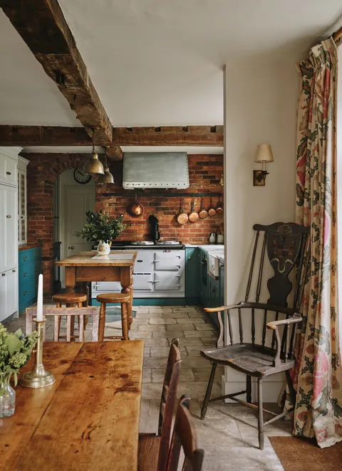 Kitchen with limestone floors in the 18th-century extension to a 16th-century house, Wiltshire, South West England [3625x5000]