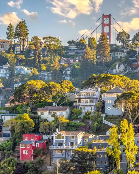 Golden Gate Bridge seen behind the hillside houses of Marin County, California.