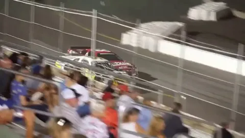 Dad rushes onto NASCAR track to save his son from burning racecar