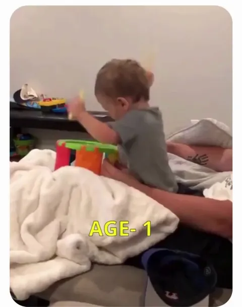 A young boy develops drumming skills at an early age.