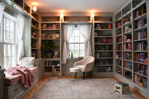 Waiting out the New England winter in our little home library