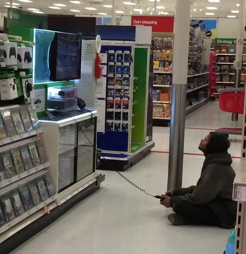 This homeless man seen casually playing Xbox at Target