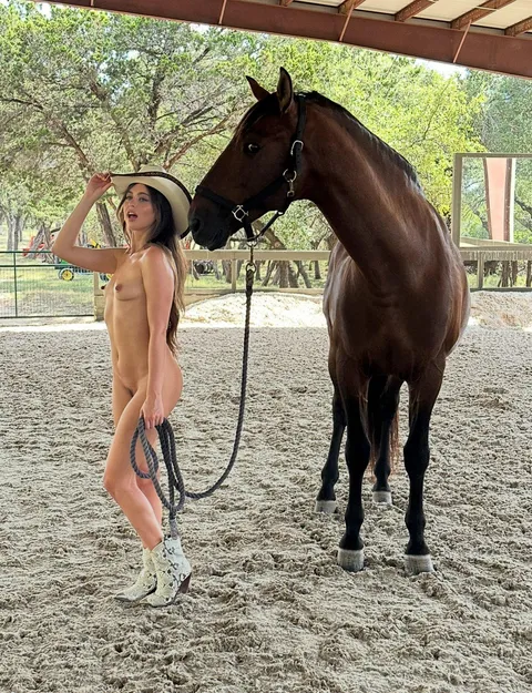 naked cowgirl and her horse