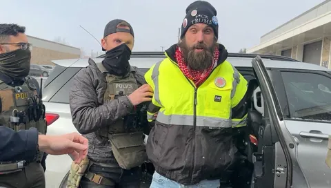 DHS/ICE abducting DaWokeFarmer aka William Kelly for peacefully protesting in St. Paul, MN (1/22/26)
