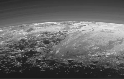 Ice mountains of Pluto. Some reach elevations of 11,000 feet !