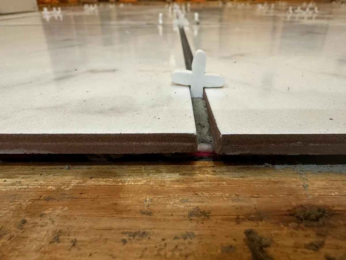 Washer flooded my laundry room so I learned how to tile.