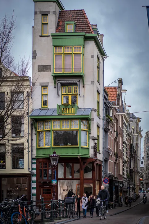 This magical looking building in Amsterdam, the Netherlands looks like it came out of a Studio Ghibli anime (found in De 9 Straatjes)