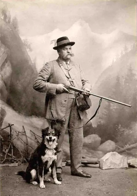 Gentleman pose for photos with their beloved pups, circa 1880-1900