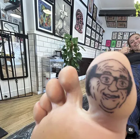 Quite possibly the greatest tattoo of all time? Danny DeVi-Toe