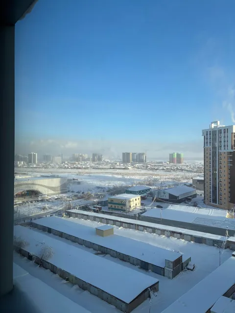 Three winter photos from my window today in Yakutsk [-29°C to -37°C/-34°F)