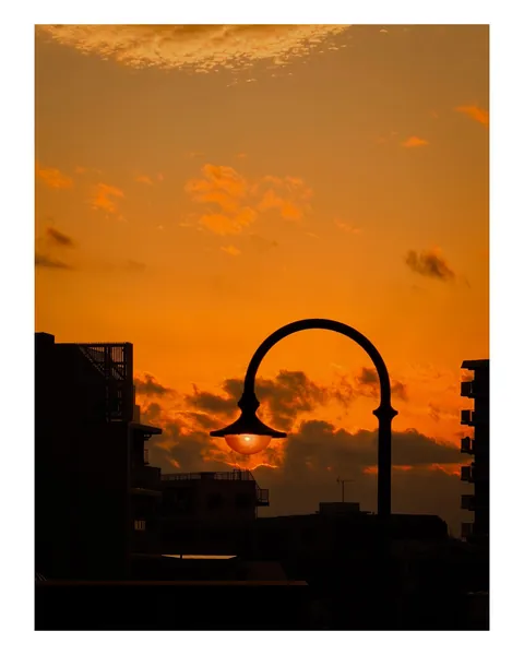 ITAP of a lamp holding on to the sunset
