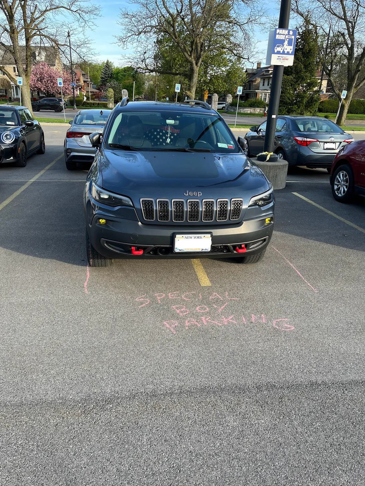 This car parks like this every day.  Still parked there after the chalked message too.