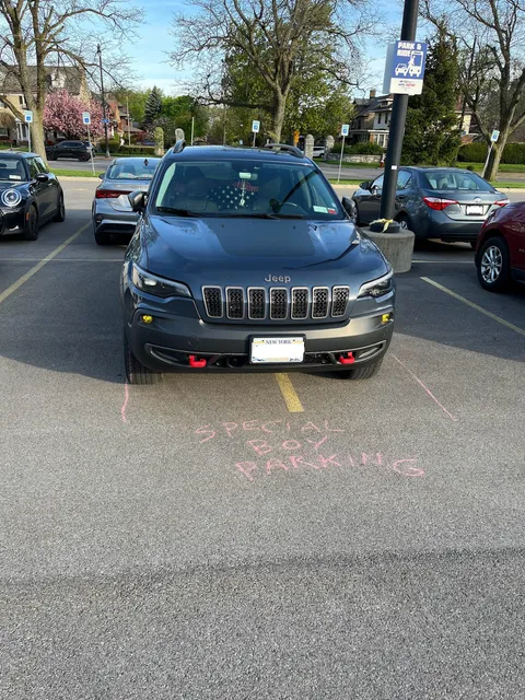 This car parks like this every day.  Still parked there after the chalked message too.