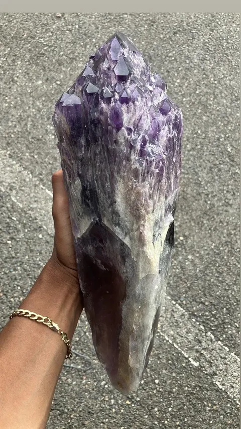 Found this Giant amethyst at a garage sale for 50 bucks the dude had no cell phone or computer and said his Uncle mined it 10 years ago. I asked him if he had any vintage clothing and he came out with this. Looks like something out of a movie.