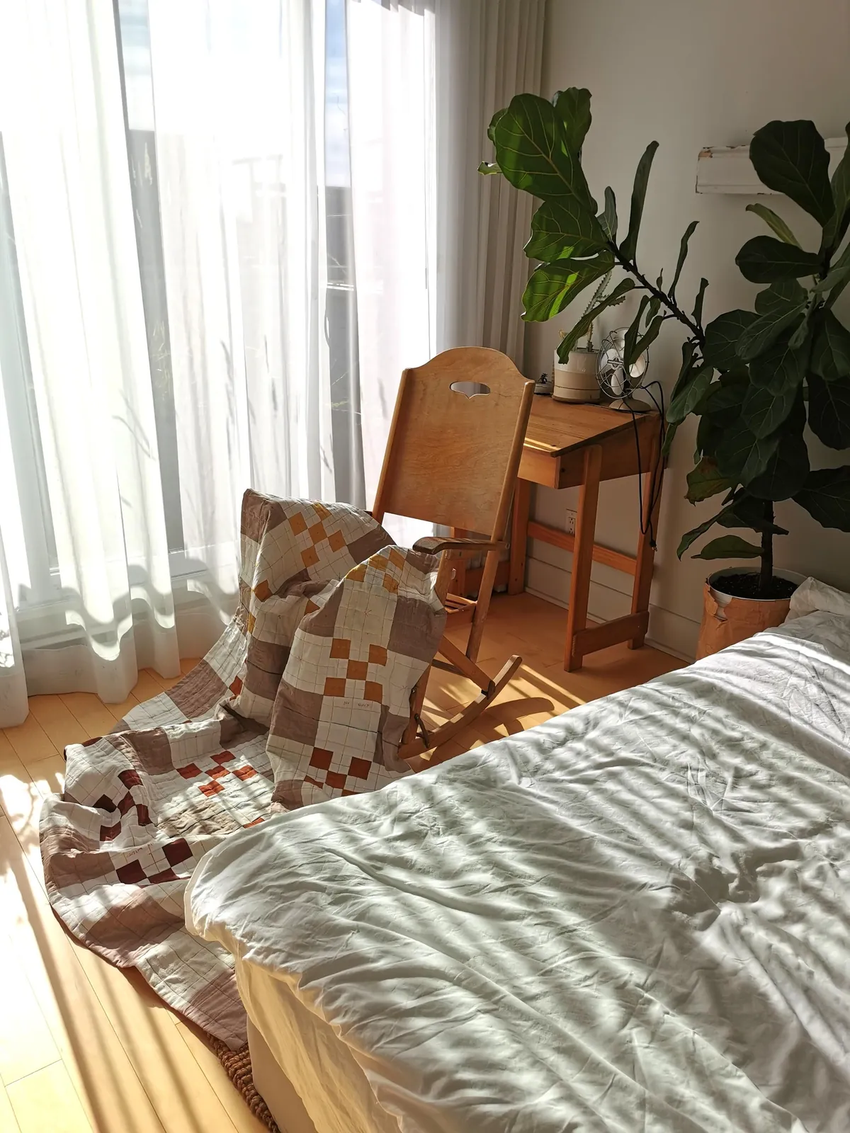 I taught myself to sew to make a cozy fall quilt for my bed. 90% thrifted fabric