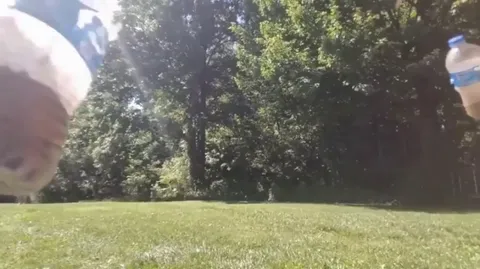 Stopping Two Moving Water Bottles With One Arrow