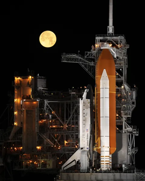 Ten years ago, The Space Shuttle Discovery under a full moon.