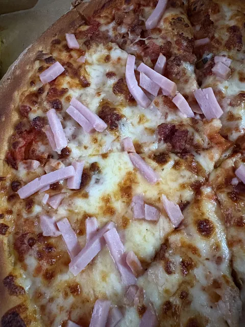 Pizza place forgot to put the ham on my pizza and just threw it on at the end