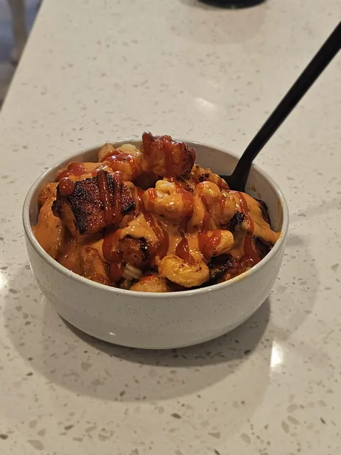 [homemade] Wife made bang bang shrimp and salmon rice bowl